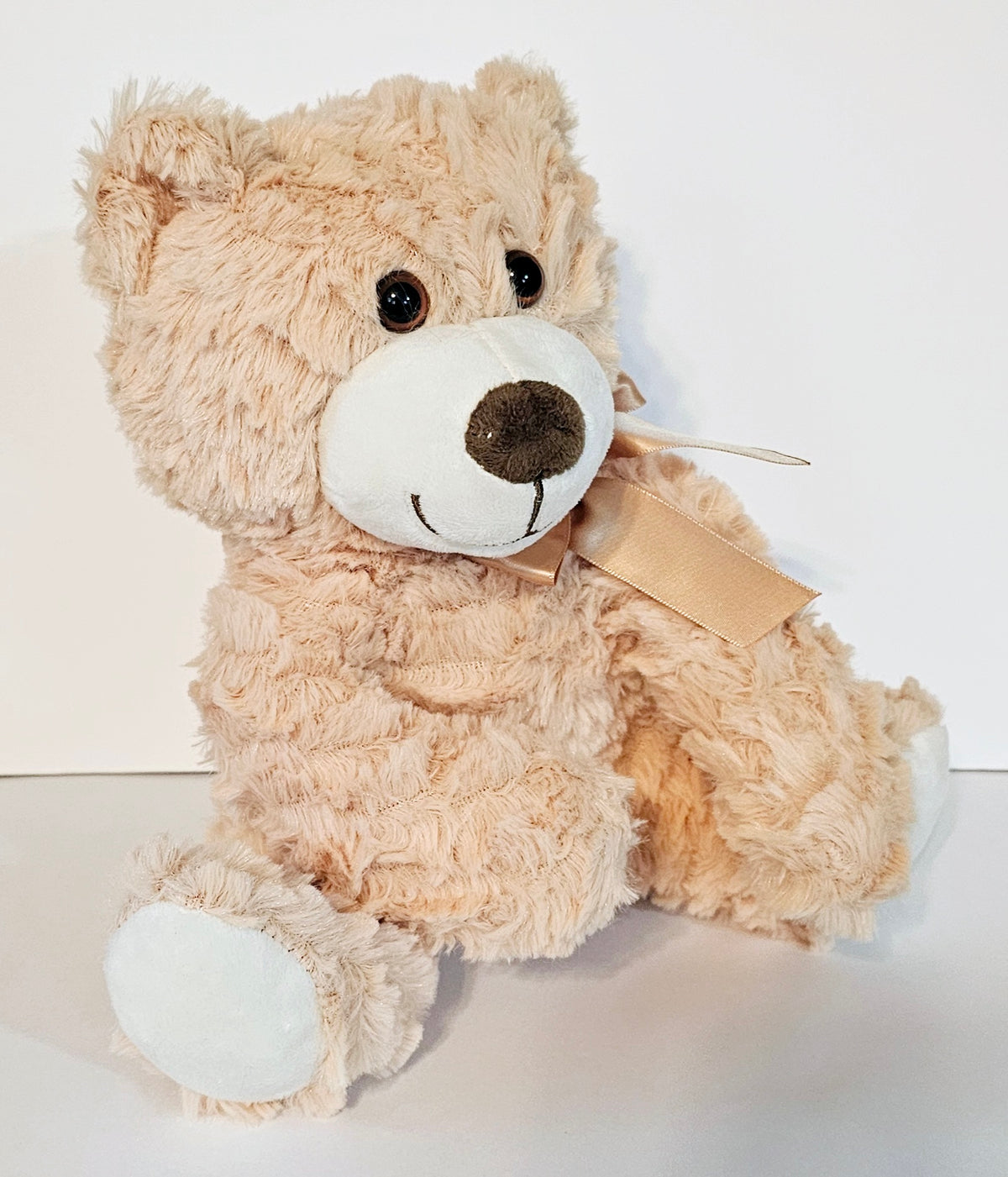 Soft & Cute Stuffed Cream Teddy Bear by Uxue Diapers Cakes