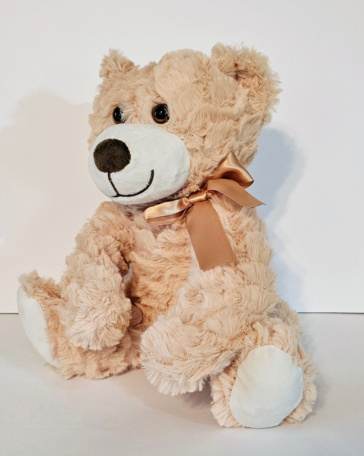 Soft & Cute Stuffed Cream Teddy Bear by Uxue Diapers Cakes
