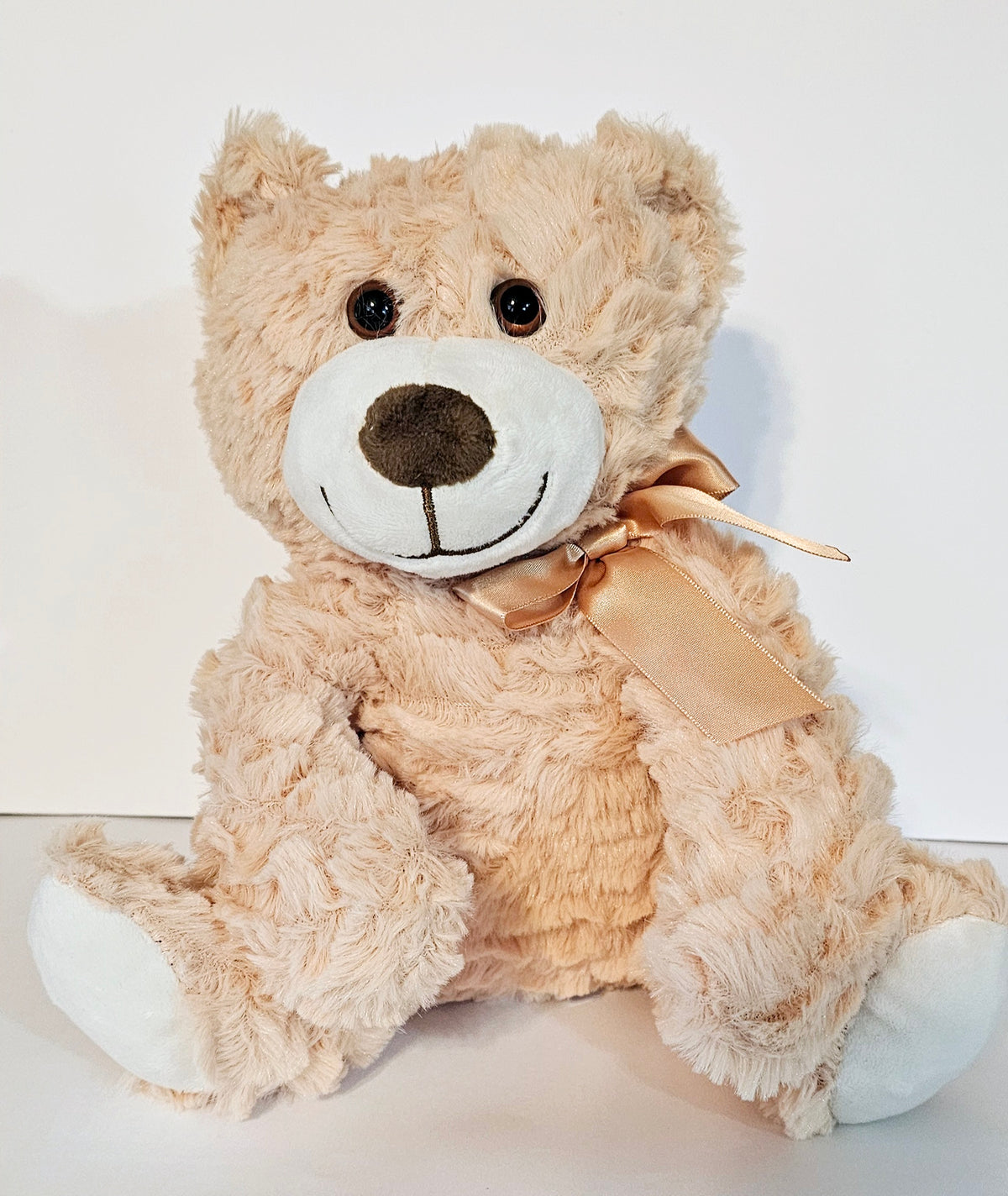 Soft & Cute Stuffed Cream Teddy Bear by Uxue Diapers Cakes